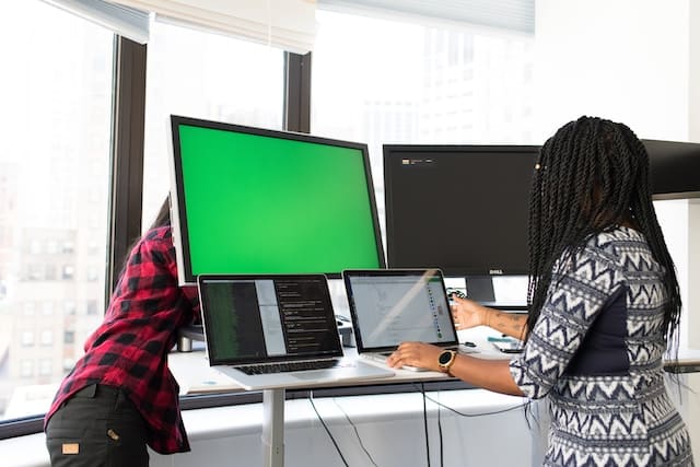 IT project manager in front of screen